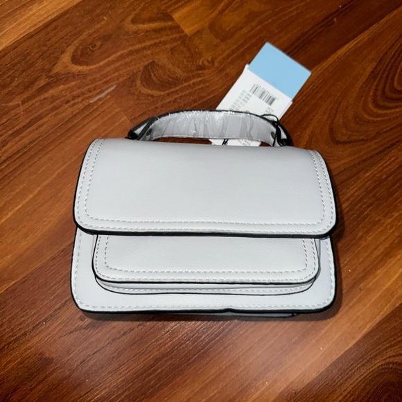 Urban Outfitters Handbags - HVISK Renei Mini Light Grey Crossbody Bag